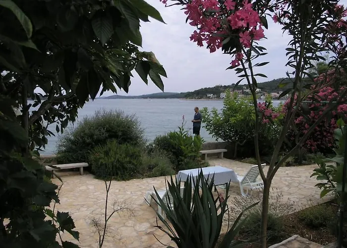 Beachfront House With Garden And Two Terraces Holiday home Tisno